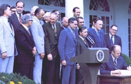 Photo of President Gerald R. Ford signing Employee Retirement Income Security Act of 1974